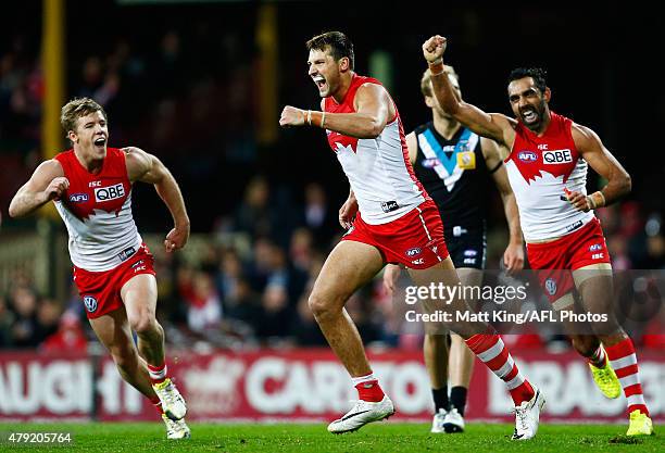 Toby Nankervis of the Swans celebrates with team mates after kicking a goal during the round 14 AFL match between the Sydney Swans and the Port...