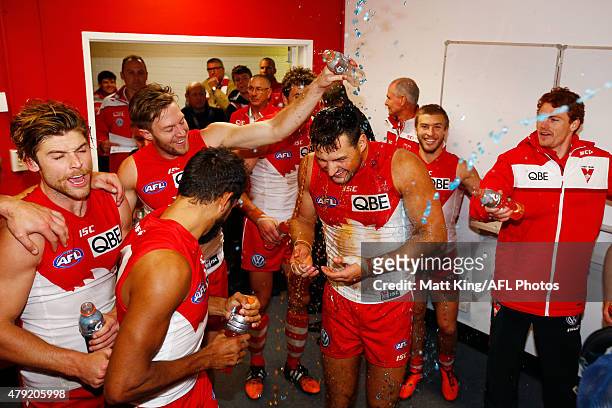 Toby Nankervis of the Swans and team mates sing the club song after winning the round 14 AFL match between the Sydney Swans and the Port Adelaide...