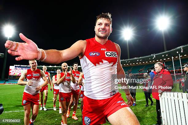 Toby Nankervis of the Swans leads the Swans from the field after victory during the round 14 AFL match between the Sydney Swans and the Port Adelaide...