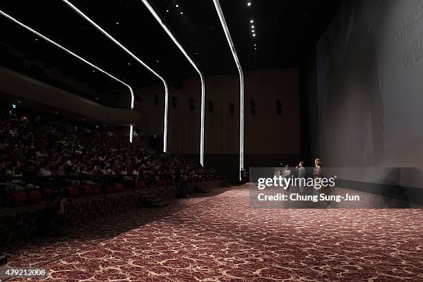 Arnold Schwarzenegger and Emilia Clarke attend the greeting to audience during the Seoul Premiere of 'Terminator Genisys' at the Lotte World Tower...