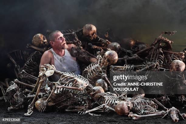 French actor Philippe Girard performs during a dressed rehearsal of William Shakespeare's "King Lear" in the Cour d'Honneur du Palais des Papes, as...