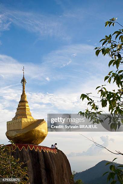 Kyaikhtiyo also called the golden rock is a well-known Buddhist pilgrimage site in Mon State, Myanmar.