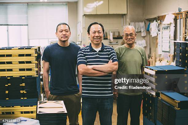 craftsman family in the studio - father son business bildbanksfoton och bilder