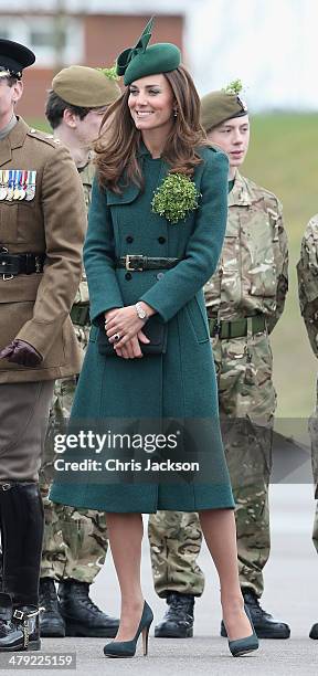 Catherine, Duchess of Cambridge laughs as she attends the St Patrick's Day parade at Mons Barracks on March 17, 2014 in Aldershot, England....