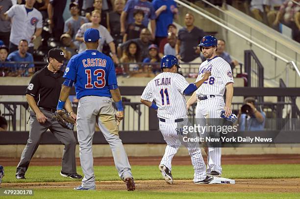 New York Mets third baseman Ruben Tejada caught stealing between 3rd and home ends up on third base with New York Mets second baseman Daniel Murphy...