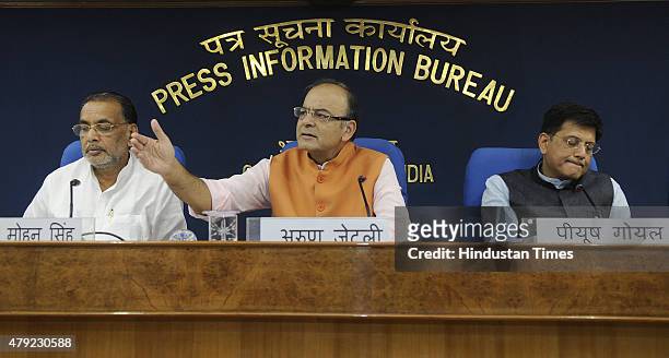 Union Minister of Finance, Minister of Corporate Affairs and Minister of Information and Broadcasting Arun Jaitley with Union Agriculture Minister...