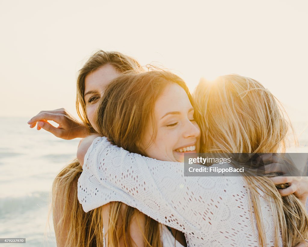 Three Friends On The Beach Together