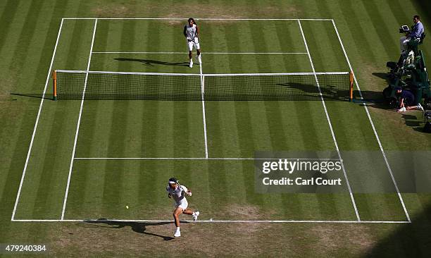 Rafael Nadal of Spain chases back to the baseline in his Gentlemens Singles Second Round match against Dustin Brown of Germany during day four of the...