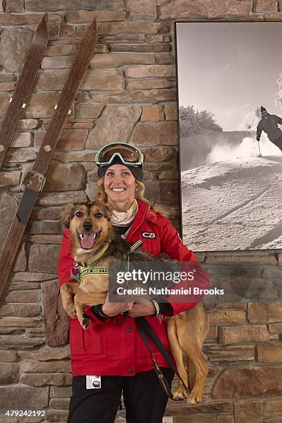 Where Are They Now: Portrait of Olympic snowboarder Lindsey Jacobellis posing with her dog, Sochi, during photo shoot at Stratton Mountain Resort....