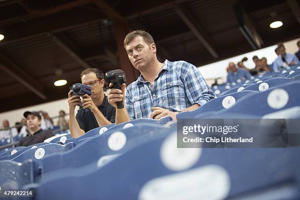 Minor League Baseball: Where Are They Now: Closeup portrait of Drew Henson seated in stands with radar gun during Clearwater Threshers vs Charlotte...