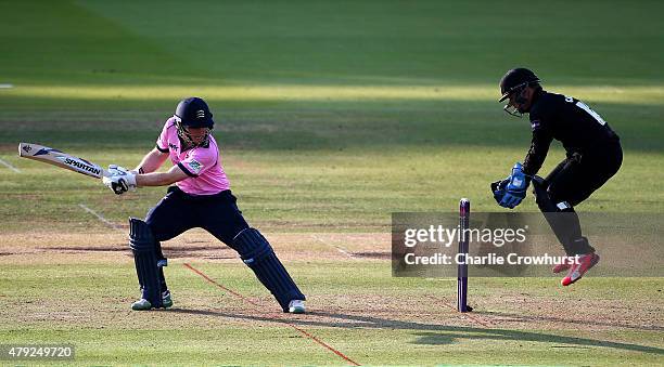 Craig Cachopa of Sussex celebrates as he catches out Eoin Morgan of Middlesex from the bowling of Steffan Piolet during the NatWest T20 Blast match...