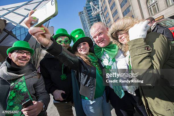 Toronto Mayor Rob Ford attends the annual St. Patrick's day Parade, takes selfies with passers by. March 16, 2014.