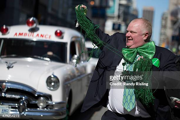 Toronto Mayor Rob Ford attends the annual St. Patrick's day Parade, takes selfies with passers by. March 16, 2014.