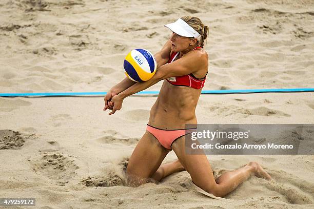 Heather Bansley from Canada bumps the ball during the FIVB Beach Volleyball World Championships quarterfinal female match between Brazil and Canada...