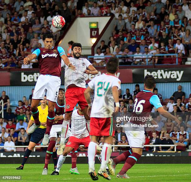 James Tomkins of West Ham heads the ball during the UEFA Europa League match between West Ham United and FC Lusitans at Boleyn Ground on July 2, 2015...