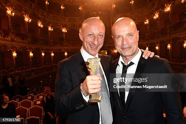 Oliver Hirschbiegel and Christian Berkel attend the Bernhard Wicki Award 2015 during the Munich Film Festival at Cuvilles Theatre on July 2, 2015 in...
