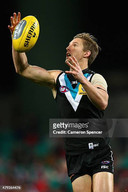Hamish Hartlett of the Power marks during the round 14 AFL match between the Sydney Swans and the Port Adelaide Power at SCG on July 2, 2015 in...