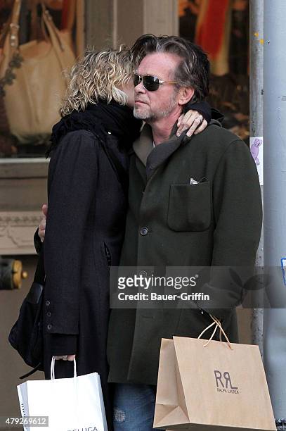 Meg Ryan and her boyfriend John Mellencamp are seen on February 14, 2011 in New York City.
