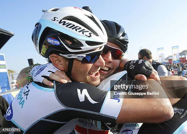 Alessandro Petacchi and Mark Cavendish of Omega Pharma-Quick Step celebrate the victory after stage six of the 2014 Tirreno Adriatico, a 189 km stage...