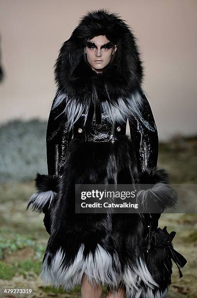 Model walks the runway at the Alexander McQueen Autumn Winter 2014 fashion show during Paris Fashion Week on March 4, 2014 in Paris, France.