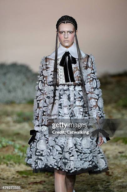 Model walks the runway at the Alexander McQueen Autumn Winter 2014 fashion show during Paris Fashion Week on March 4, 2014 in Paris, France.