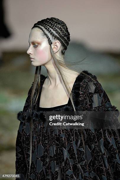 Model walks the runway at the Alexander McQueen Autumn Winter 2014 fashion show during Paris Fashion Week on March 4, 2014 in Paris, France.