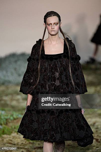 Model walks the runway at the Alexander McQueen Autumn Winter 2014 fashion show during Paris Fashion Week on March 4, 2014 in Paris, France.