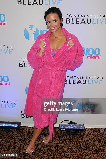 Demi Lovato poses at the Y-100 cool for the summer pool party held at the Fontainebleau on July 2, 2015 in Miami Beach, Florida.