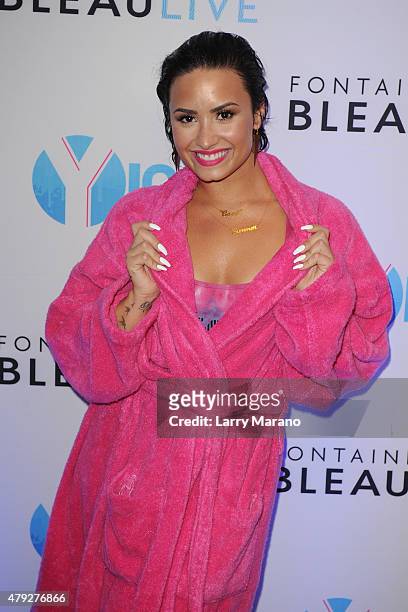 Demi Lovato poses at the Y-100 cool for the summer pool party held at the Fontainebleau on July 2, 2015 in Miami Beach, Florida.