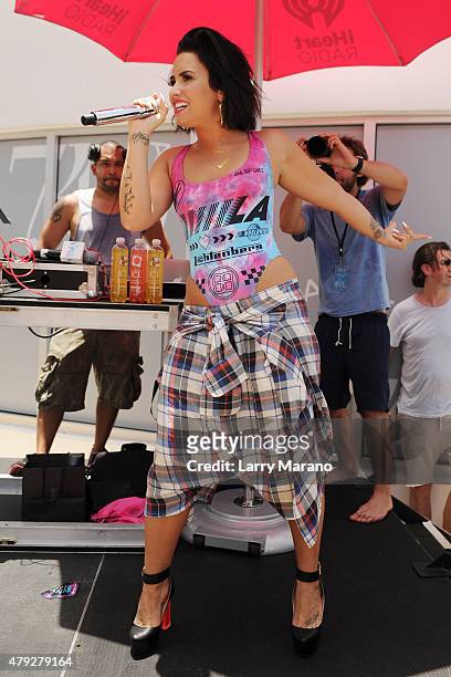 Demi Lovato performs at the Y-100 cool for the summer pool party held at the Fontainebleau on July 2, 2015 in Miami Beach, Florida.