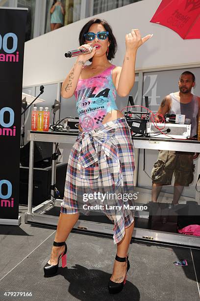 Demi Lovato performs at the Y-100 cool for the summer pool party held at the Fontainebleau on July 2, 2015 in Miami Beach, Florida.