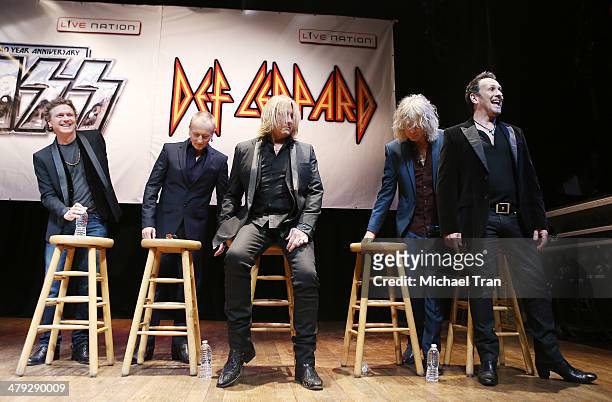 Rick Allen, Phil Collen, Joe Elliott, Rick Savage and Vivian Campbell of Def Leppard attend the announcment of their 2014 Summer tour held at The...