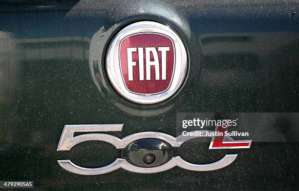 The Fiat logo is displayed on a Fiat 500L at Fiat of San Francisco on March 17, 2014 in San Francisco, California. Fiat Chrysler announced a recall...
