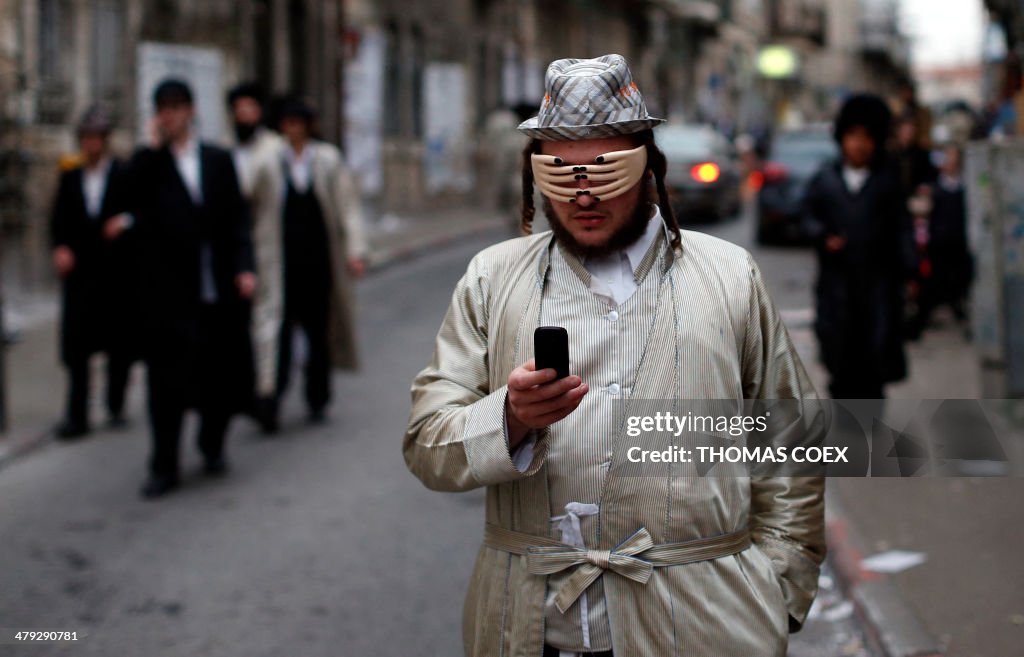 TOPSHOT-ISRAEL-PURIM-RELIGION