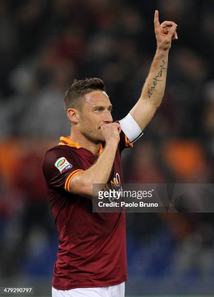 Francesco Totti of AS Roma celebrates after scoring the opening goal during the Serie A match between AS Roma and Udinese Calcio at Stadio Olimpico...