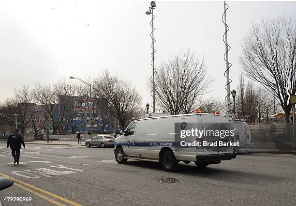 Medical examiners van leaves the scene outside the Chelsea apartment building on March 17, 2014 in New York City, where fashion designer L'Wren Scott...