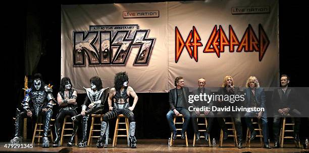 Members Gene Simmons, Eric Singer, Tommy Thayer and Paul Stanley appear on stage with Def Leppard members Rick Allen, Phil Collen, Joe Elliot, Rick...