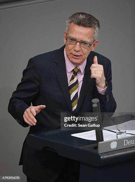 German Interior Minister Thomas de Maiziere speaks during debates at the Bundestag on July 3, 2015 in Berlin, Germany.The Bundestag debated proposed...