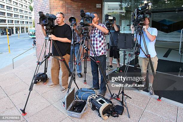 News crews wait outside the Hyatt Regency Perth where Mick Jagger and the Rolling Stones are staying during the first leg of their Australian tour on...