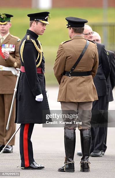 Prince William, Duke of Cambridge attends the St Patrick's Day parade at Mons Barracks on March 17, 2014 in Aldershot, England.