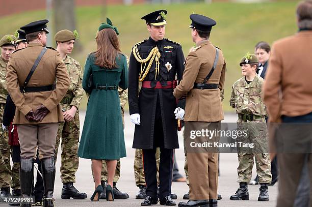 Catherine, Duchess of Cambridge and Prince William; Duke of Cambridge attend the St Patrick's Day parade at Mons Barracks on March 17, 2014 in...