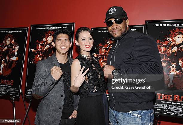Actors Iko Uwais and Julie Estelle and professional boxer Jarrell 'Big Baby' Miller attend "The Raid 2" special screening at Sunshine Landmark on...