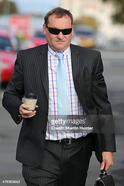 Lachie McLeod, former South Canterbury Finance chief executive arrives at the High Court in Timaru on March 18, 2014 in Timaru, New Zealand. Three...
