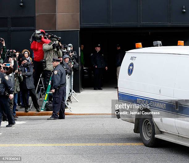 The medical examiners van departs the Chelsea apartment building transporting the body of Fashion Designer L'Wren Scott, who was found dead earlier...