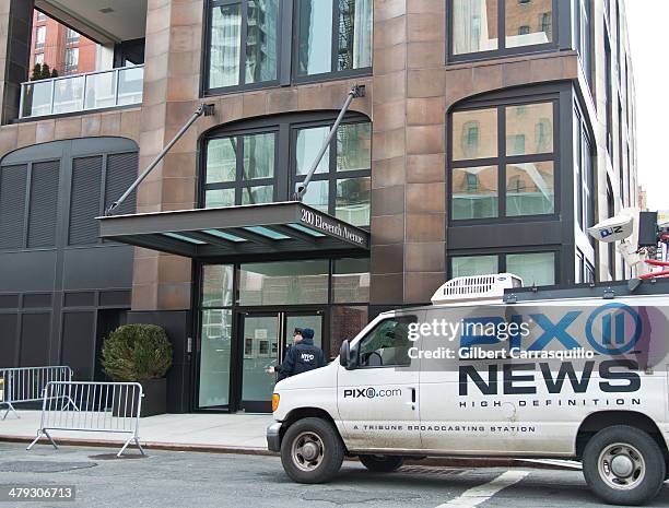 General view of the scene outside 200, 11th Avenue, the Chelsea apartment building on March 17, 2014 in New York City, where fashion designer L'Wren...