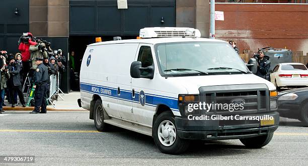 The Medical Examiner's van is seen leaving the scene of the Chelsea apartment building on March 17, 2014 in New York City, where fashion designer...