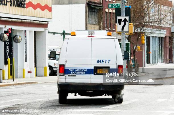 The Medical Examiner's van is seen leaving the scene of the Chelsea apartment building on March 17, 2014 in New York City, where fashion designer...