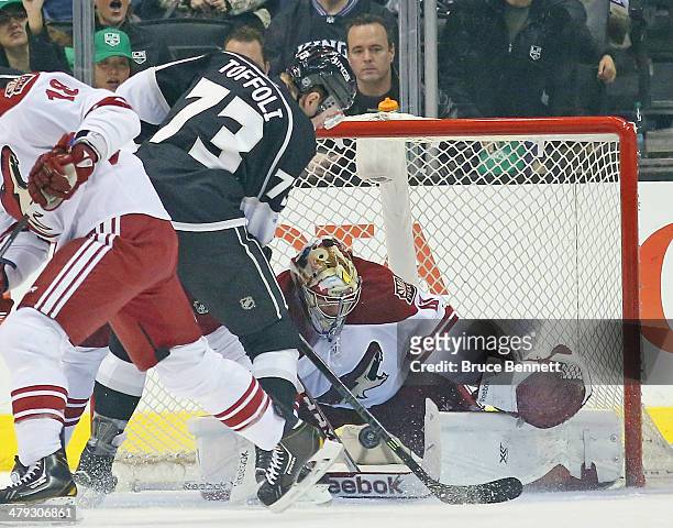 Mike Smith of the Phoenix Coyotes makes the first period stop on Tyler Toffoli of the Los Angeles Kings at the Staples Center on March 17, 2014 in...