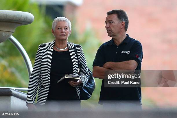 Frontier Touring Company employee waits on the driveway of the Hyatt Regency Perth hotel where Mick Jagger and the Rolling Stones are staying during...