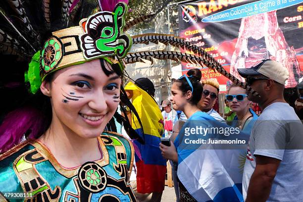 young woman dressing as aztecs indian - calle ocho carnival stock pictures, royalty-free photos & images